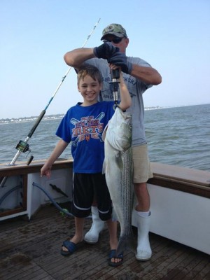 11 year old Shawn Edger proudly displays his caught a 37" bass off Old Saybrook with Sea Sprite Sportfishing.