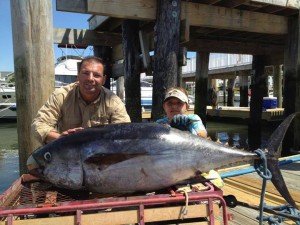 Larry and Logan Richards bringing in a 175 lb Big Eye Tuna out of the Baltimore Canyon. Shared on Two Chums Bait & Tackle's Facebook page