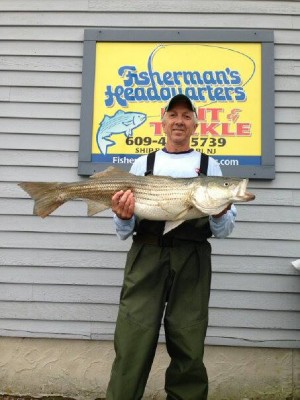 Don Roberts with a 16.7-pound striper weighed in for the LBI surf derby.