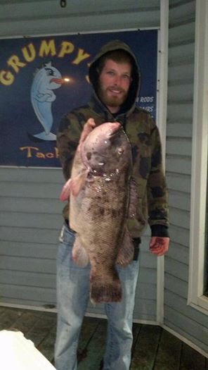 Capt. Jeff Crilly with a huge 17.6 pound tog! Photo courtesy of Grumpy's Tackle.