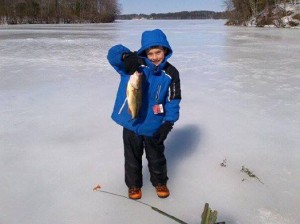 Chris Phaneuf and his son Drew enjoyed the late-March ice-fishing with a nice bass from North Andover.