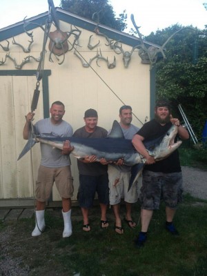 Team Dusky with the 260-pound Mako that won the 2013 Snug Harbor Marina Shark Tournament.