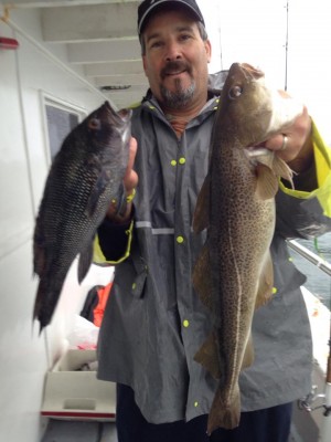 Tom Fravel shows off his pool-winning cod caught out of Niantic this week.