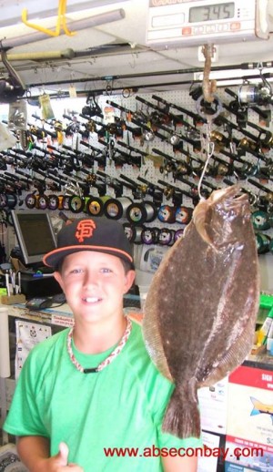 Andrew Brochawski giving a big thumbs up and a smile for his 4 1/2-pound flounder.