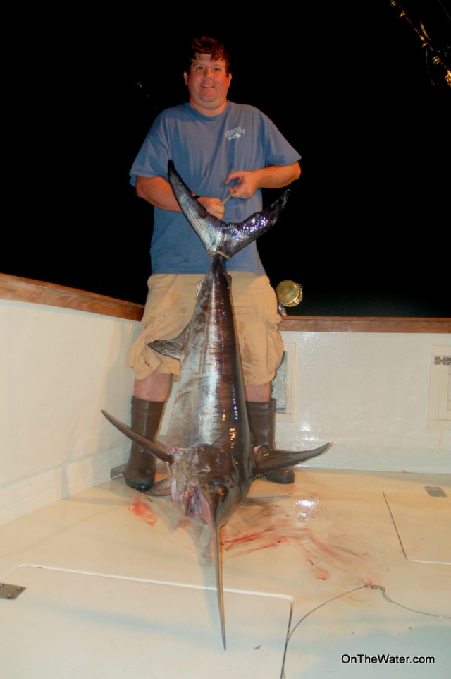 OTW's Rich Dunn and a 100-pound swordfish. 
