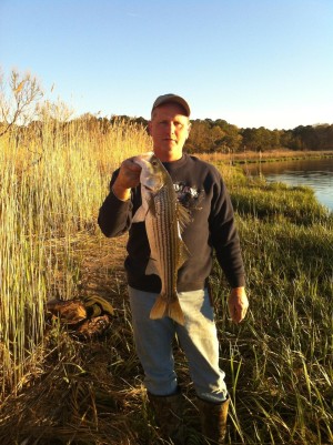 Jim Konkel with a nice early season striper.