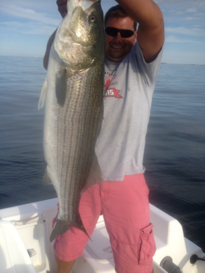 Jimmy Crooker hoists his 50" bass.