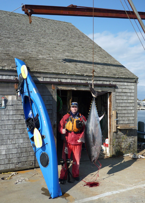 Dave Lamoureux poses next to the 157-pound bluefin tuna that he caught on November 11, 2009, setting the world record for largest bluefin tuna caught legally and unassisted from a kayak.
