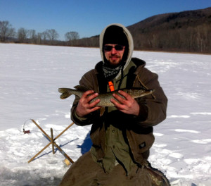 Jon George with a nice pike on Woods Pond in Western MA.
