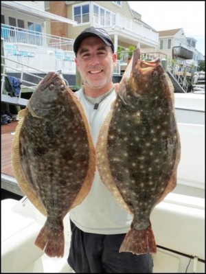 No question that the fluke bite is on if you ask Craig Rogers of Wynnewood, PA!  These 2 6# beauties were taken on a big profile B2 squid trailed with GULP swimming mullet and a long strip of salted mackerel. 