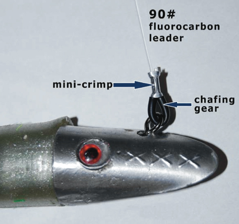 Whenever possible, use crimps instead of knots. The chafing gear prevents the leader from fraying on the connection.