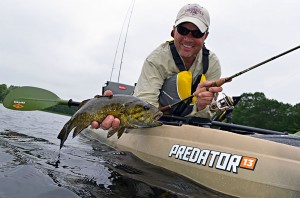 Chris Megan with a nice smallmouth bass caught in the Penobscot River.