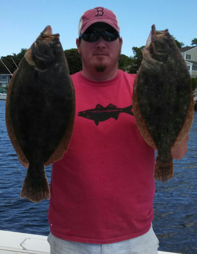 The author with two nice fluke taken this weekend.