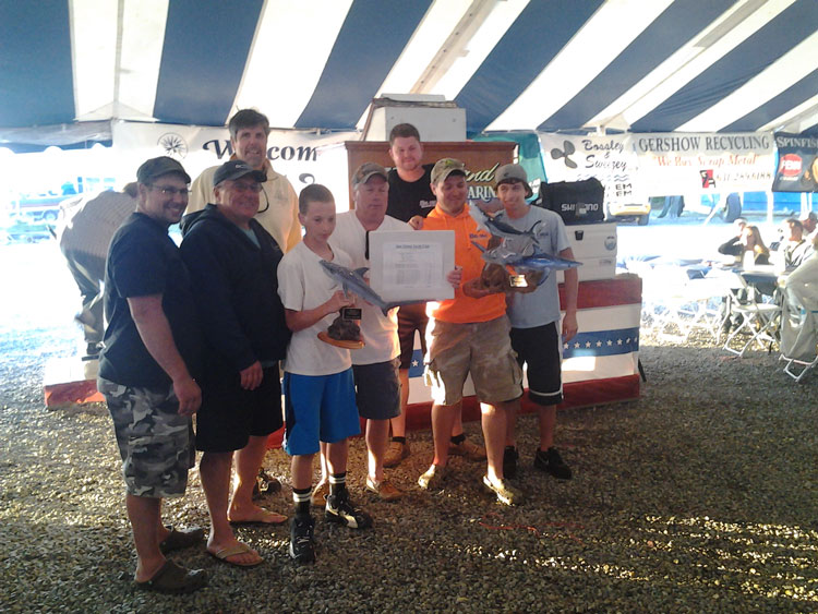 The crew of the “Reel Deal” pose with their trophies during the awards ceremony at the 28th Annual Star Island Shark Tournament on June 13-14.