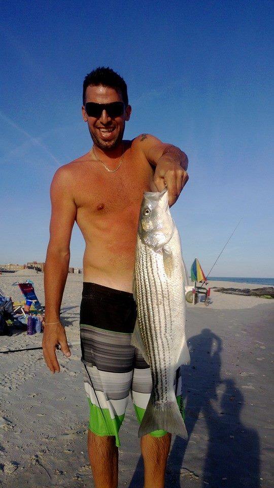 Matthew Schmidt with a striper taken off Long Beach last week.