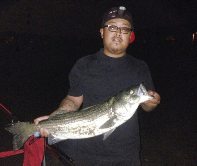 Tony Boss with a north shore striper.