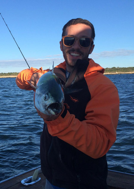 Eric Spicer with a nice albie caught on a homemade fly while fishing out of Newport.