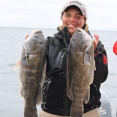 Daphne Forster with a pair of early season Rhode Island tautog.