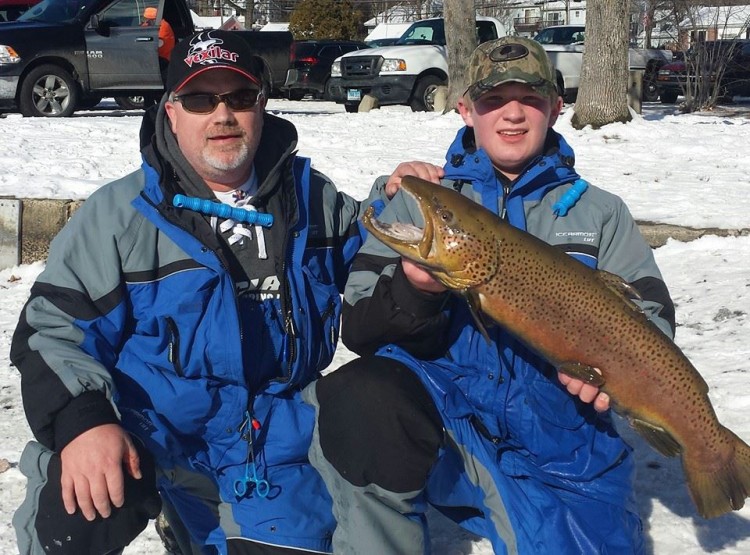 Michael and Brandon Jasensky with their tournament winning fish at Highland lake.