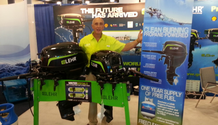 Capt Bernardo Herzer, founder and CEO of Lehr, introduces the Lehr 25 hp propane outboard at the Miami Boat Show.