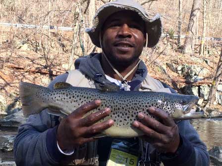 Kriston Miller of Downingtown, PA and his beautiful 23-inch trout.