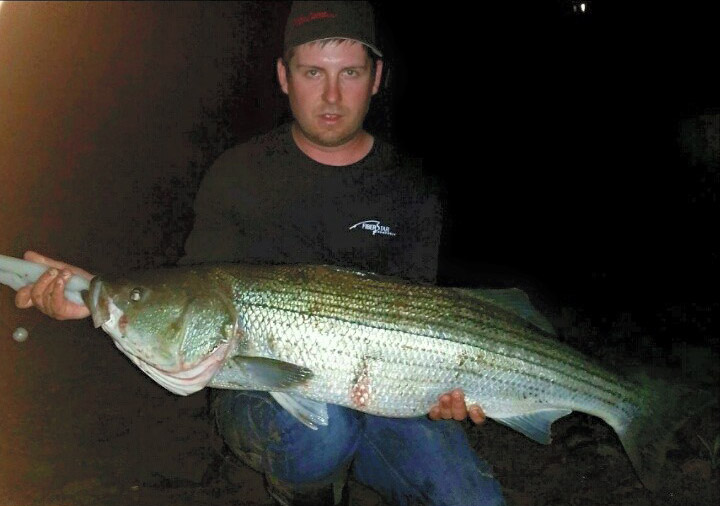 Mike Benzinger with a 43", 37-pound striper