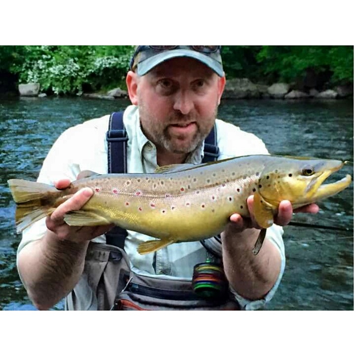 Torrey Collins with a big Farmington river brown.