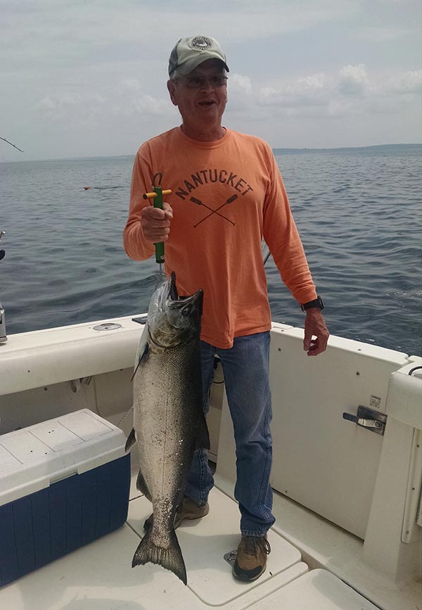 John with a nice king he caught on the 4th