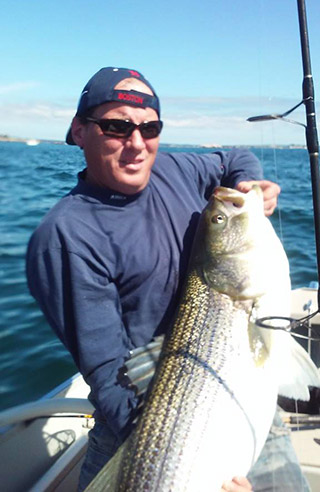 Brian DeLeo hooked into this big striper this past week.