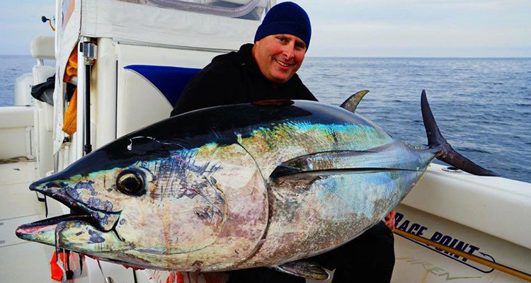 Kevin Pawsey with a giant bluefin caught off of Truro, MA