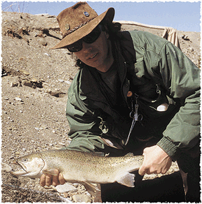 John Trainer, Finleyville, shows an Elk Creek steelhead caught on a chrome-headed white jig. 