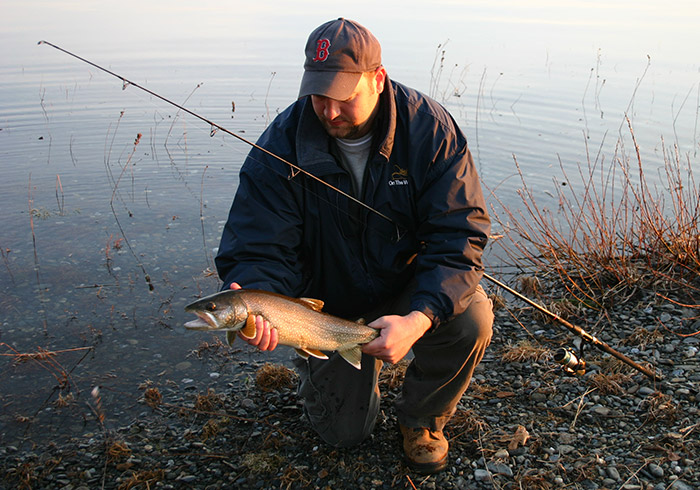 You may have to bundle up, but a day spent fishing windward shorelines may result in a rainbow such as this one caught by Andy Nabreski.