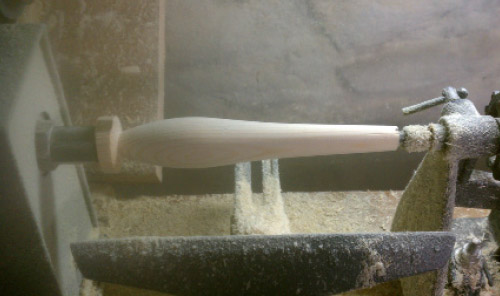 A pencil popper comes to life as its shape is created on the lathe.