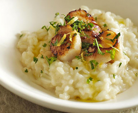 Saut&eacute;ed bay scallops over risotts