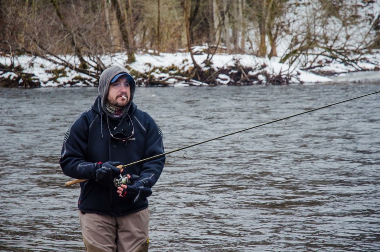 Ryan Bibeau keeps his eyes on the float as it drifts down-river. 