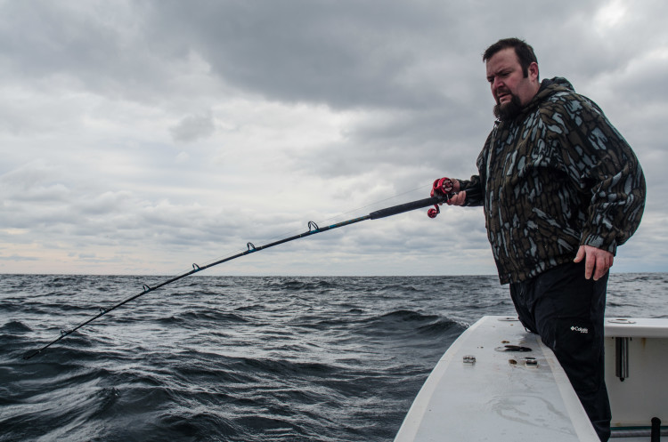 Seas were sporty, but the cod were hungry. Richie LAST NAME waits for a bite. 