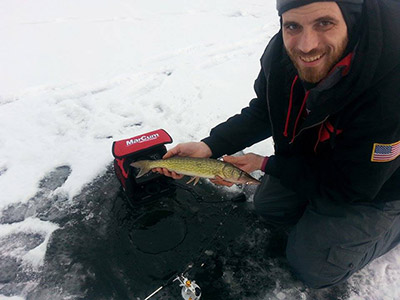 Kris Bretz reeled in a Chain Pickerel while ice fishing on Hills Creek Lake.