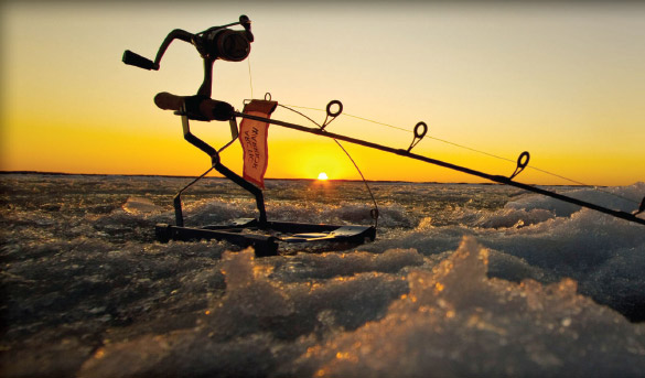 An additional advantage of rod traps is that there is no hardware in the water. It's a stealthier presentation well suited for anglers targeting trout, which often cruise just below the ice. <em>-photo courtesy Clam Corp.</em>