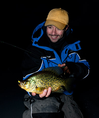 The author with a crappie coaxed to bite using a Custom Jigs & Spins Poppee teardrop jig.