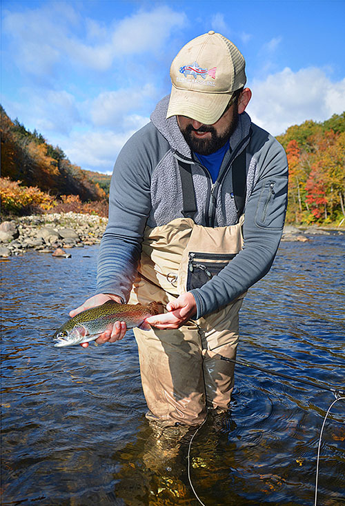 Veteran Dan Laffin shows off a beautiful Deerfield River rainbow.