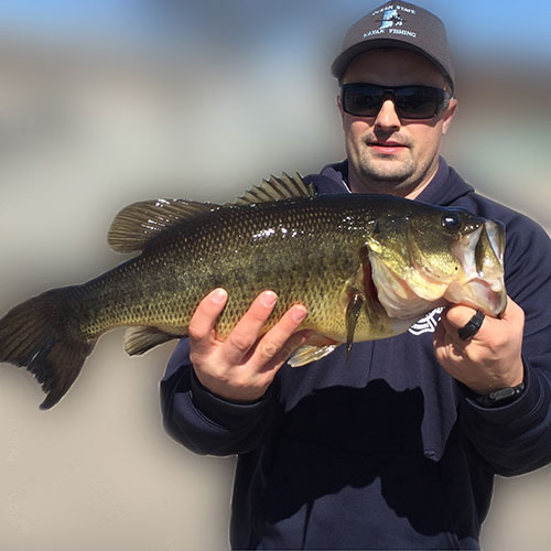 James Chappel with a 5.5 pound bass that he caught on a jig with crawfish trailer.
