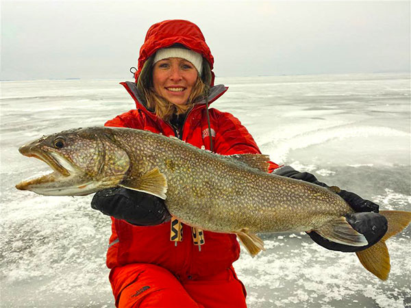 Kelly Brooks of Waterbury caught this 30-inch lake trout while ice fishing on Lake Champlain in early 2015