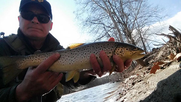 Guide Steve Hogan with a solid 18&rdquo; brown from a Farmington River C&R area.