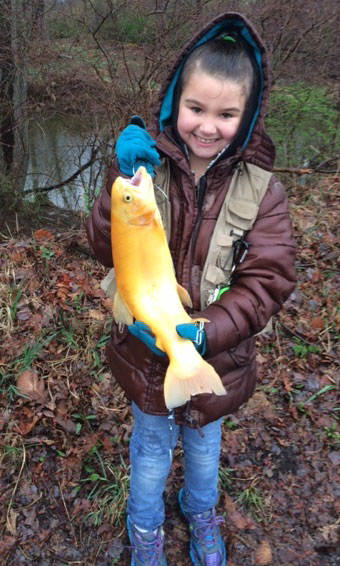 Regan Fahringer of Lehighton, PA proudly displaying a 19 1/2 inch Golden Trout