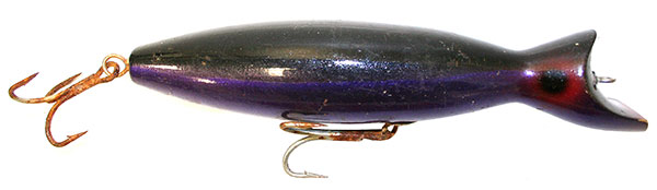 The NorthBar Tackle wooden bottle plug casts far and digs deep in even the heaviest currents.