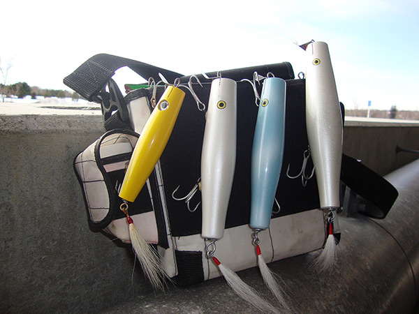 An assortment of Danny-style plugs in sizes from 4&frac12; to 7&frac12; inches do a great job mimicking the river herring and other baitfish that early-season stripers feed on in the back waters.