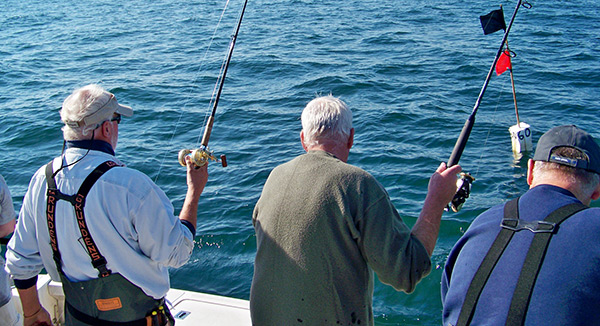 The crew tries their luck casting to a lobster pot
