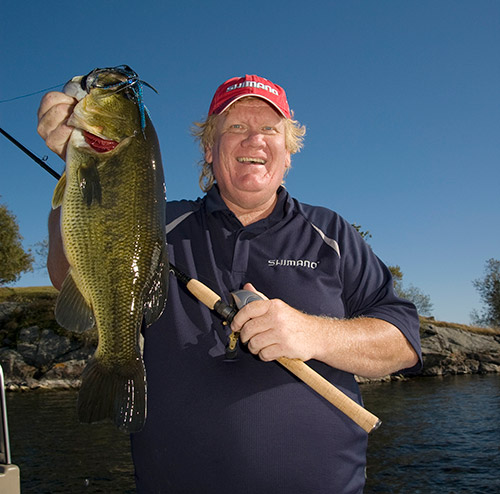 “Big” Jim McLaughlin wiggled a jig in deep weeds to fool this nice largemouth.