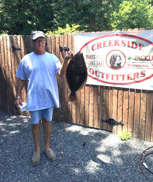 Rich Johnston caught this keeper fluke on squid at Barnegat Light. 