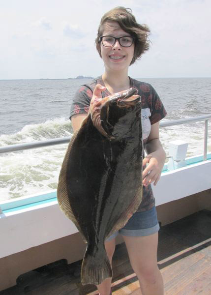 The-first-fish-Alexis-Carbahal-ever-caught-was-this-7-pound-fluke-landed-on-the-Elaine-B.-II.